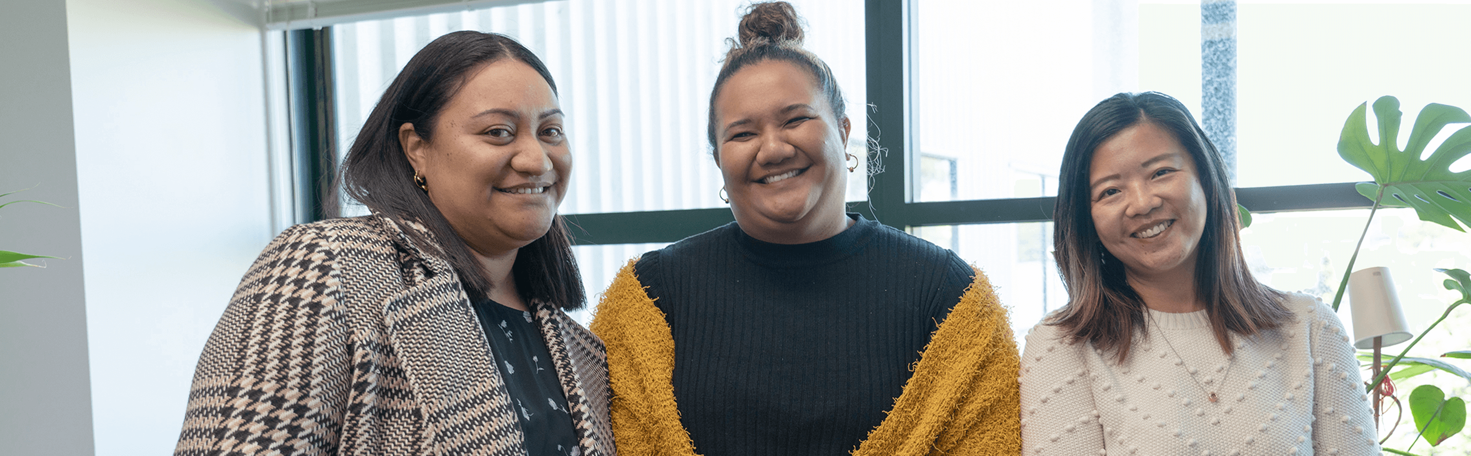 Keeping it in the family: Andrea Patai (centre) with customer service & Alsco sales support coordinator Charlene Pulefale and business data analyst Michelle Yuen. Photo: Robert Mak.